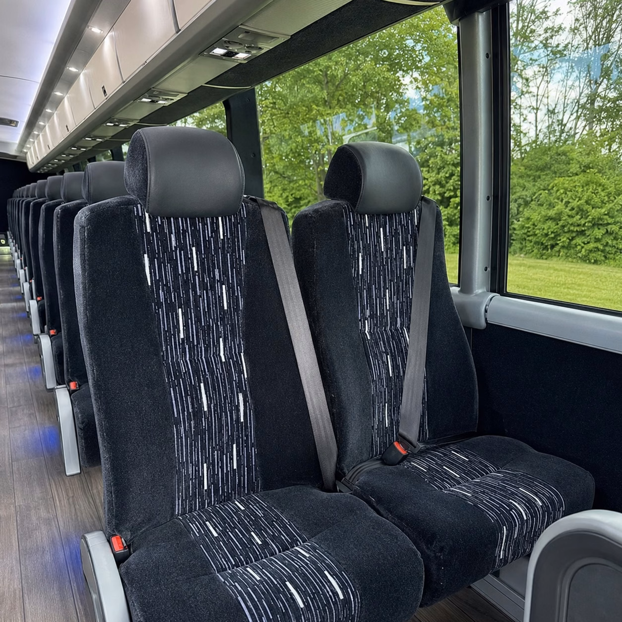 how the time of year and seasonal demand affect norman charter bus prices